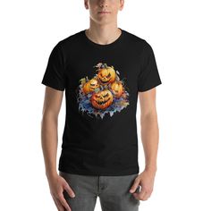 Looking for a spooky Halloween shirt that will make you stand out from the crowd? Look no further than our men's pumpkin shirt! Made with a graphic of evil pumpkins this shirt is perfect for any fan of the holiday. Whether you're dressing up for a party or just hitting the town, our men's Halloween shirt is sure to turn heads. So what are you waiting for? Add it to your shopping cart today! This t-shirt is everything you've dreamed of and more. It feels soft and lightweight, with the right amount of stretch. It's comfortable and flattering for all.  * 100% combed and ring-spun cotton (Heather colors contain polyester) * Fabric weight: 4.2 oz./yd.² (142 g/m²) * Pre-shrunk fabric * Side-seamed construction * Shoulder-to-shoulder taping * Blank product sourced from Nicaragua, Mexico, Honduras Horror Halloween Shirt With Short Sleeves, Black Horror Shirt For Halloween, Mens Halloween Shirts, Horror Movie Night, Jumpsuit And Cardigan, Evil Pumpkin, Pumpkin Spice Shirt, Pumpkin Face, Pumpkin Shirt