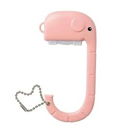 a pink elephant shaped object with a chain attached to it's back and side