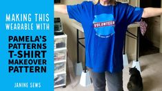 a woman standing next to a cat wearing a blue t - shirt that says, making this wearable with