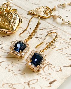 Experience the beauty of these Renaissance Earrings, featuring faux glass sapphires. These stunning earrings are sure to add a touch of elegance to any ensemble. Perfect for special occasions or everyday wear. Sapphire faux glass gold plated brass earrings. Stunning Earrings, Brass Earrings, Free Giveaway, The Beauty, Special Occasion, Everyday Wear, Gold Plate, Sapphire, Plating