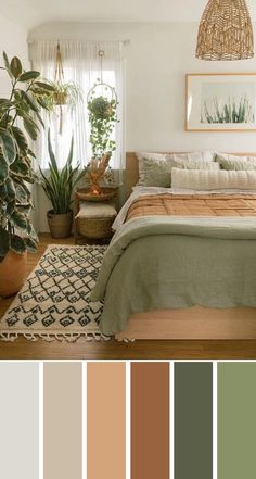 a bedroom with white walls, green bedding and rugs in front of the bed