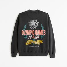 Classic sweatshirt in our softAF fleece fabric and oversized-fit silhouette, featuring vintage Olympics-inspired graphic detail at left chest and back, crew neckline and banded hem and cuffs. Fall Logo Print Crew Neck Sweats, Fall Crew Neck Sweats With Logo Print, Athleisure Sweats With Graphic Print For Winter, Athleisure Winter Sweats With Graphic Print, Winter Athleisure Sweats With Graphic Print, Fall Athleisure Sweats With Logo Print, Spring Graphic Print Crew Neck Sweats, Graphic Print Sweats For Sports Season Streetwear, Throwback Logo Print Sweatshirt For Fall