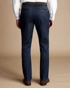 Smart Stretch Texture Trousers - Denim Blue | Men's Charles Tyrwhitt Smart Stretch Texture Trousers - Denim Blue Size W30 L30 Cotton Fitted Denim Blue Bottoms For Business Casual, Blue Slim Fit Jeans For Business Casual, Fitted Blue Jeans With Straight Hem, Fitted Denim Blue Pants For Business Casual, Classic Indigo Tapered Leg Bottoms, Classic Fitted Jeans With Welt Pockets, Classic Blue Straight Fit Bottoms, Classic Straight Fit Blue Bottoms, Blue Slim Fit Bottoms With Straight Hem