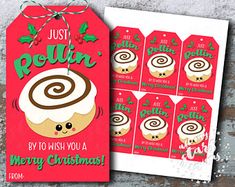 a christmas card with a cupcake on it and the words just rollin by to wish you a merry christmas