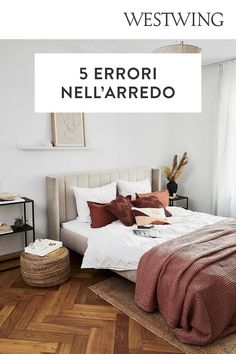 a bedroom with wood floors and white walls, the words westwing 5 errori nelarredo