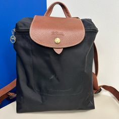 Longchamp Le Pliage Backpack In Black Nylon With Adjustable Straps Height 31cm (12.2 In) Width 24.5cm (9.65 In) Gusset 10cm (3.94 In). Longchamp Bags, Longchamp Le Pliage Backpack, Black Nylon, Longchamp Le Pliage, Black Nylons, Black And Brown, Brown Leather, Adjustable Straps, Bag Lady