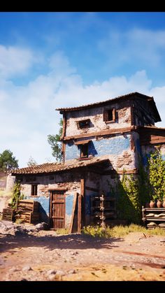 an old abandoned building sitting on the side of a dirt road in front of a blue sky