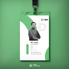 a green id card with a man's face on it, hanging from a lanyard