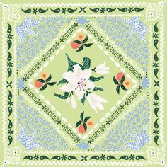 a green square with flowers and leaves on it