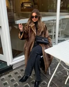 How to Get the Mob Wife Aesthetic With Faux Fur Coats Fashionable Coats For Women, City Winter Fashion, How To Style A Fur Coat, Nyc Winter Fashion Cold Weather, New York Chic Outfits, Winter Outfits Fur Coat, Faux Fur Coat Outfit Winter Chic, Winter Styling Outfits, Fur Winter Outfits