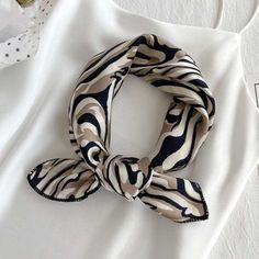 We're all about multifunction & versatility so we are in love with these! 
Square and very soft, fashionable silk...   
-Scarf 
-Bag Accessory 
-Hair Tie 
-Bracelet 
...endless possibilities! Hand Kerchief, Small Neck Scarves, Neck Scarfs, Hair Bands For Ladies, Scarf Storage, Lady Hair, Hair Tie Bracelet, Silk Headscarf, Womens Boat Shoes