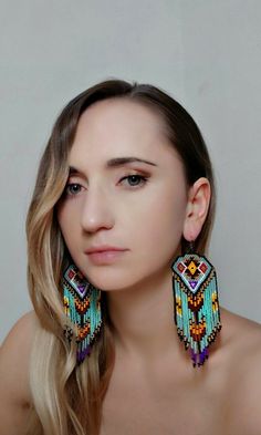 https://www.etsy.com/listing/903391212/native-america-style-bead-earrings?ref=shop_home_active_7&frs=1 Handmade Southwestern Green Earrings, Handmade Southwestern Green Beaded Earrings, Handmade Turquoise Artisan Beaded Earrings, Handmade Artisan Turquoise Beaded Earrings, Artisan Handmade Turquoise Beaded Earrings, Handmade Turquoise Earrings For Festival, Unique Handmade Turquoise Beaded Earrings, Turquoise Bohemian Beaded Single Earring, Earring Indian