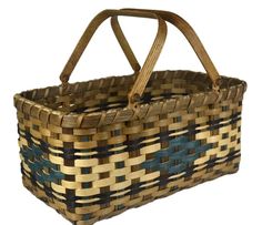 a woven basket with wooden handles is shown in this image, it's brown and blue