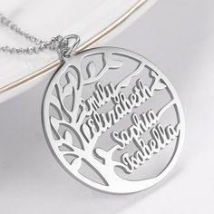 Christmas is coming, don't know what gifts for family and lover?There are a plethora of gorgeous designs that can be customized with a name, two names, or even inspirational words that you love. Name Necklace Official provides affordable engravable jewelry that won't break the bank. In addition, these pieces make for very thoughtful and appreciated gifts for friends and family. Give them to someone celebrating a birthday, graduation, baby shower, or anniversary. The finishes are beautifully poli Tree Name, Customized Name Necklace, Symbol Of Life, Custom Family Tree, Portrait Necklace, Picture Necklace, Family Tree Necklace, Family Names, Family Necklace