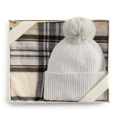 Spruce up your cool weather wardrobe with this women's pompom beanie and plaid scarf duo from Nine West.Spruce up your cool weather wardrobe with this women's pompom beanie and plaid scarf duo from Nine West. How do you accessorize? Check out our ACCESSORIES GUIDE for essential tips to elevate your style with must-have accessories.FEATURES Includes scarf, beanie & gift box Hat: 0.5-in. brim, 8.5"H x 8.5"W, faux fur pompom Scarf: 21"W x 72"L + 1" self fringe, allover plaid print LightweightFABRIC Accessories Guide, Pompom Beanie, Pompom Scarf, Box Hat, Cool Weather, Plaid Print, Plaid Scarf, Nine West, Elevate Your Style