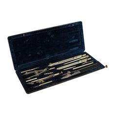 an assortment of tools in a case on a white background