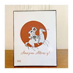 an orange and white greeting card featuring a man on a horse with the words, amazonn