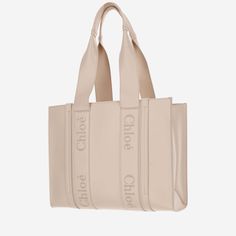 Bag made of leather Two on-top handles Front logo Top opening Beige Made in Italy Composition: 100% leatherHeight: cm 29Width: cm 38Depth: cm 12 Chloe Shoulder Bag, Monogram Bracelet, Beige Bag, Medium Tote, Weekender Tote, Small Rings, Pink Logo, Long Wallet, Leather Tote Bag