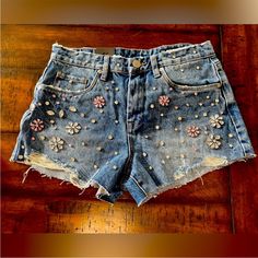 [Blanknyc] The Barrow Embellished Stone Detail Cut Off Vintage High Rise Denim Shorts Size 26 Brand New: Never Worn Embellished Denim Blue Denim Bottoms, Trendy Embellished Denim Blue Bottoms, Blue Denim Jean Shorts With Rhinestones, Casual Medium Wash Rhinestones Bottoms, Mid-rise Embellished Denim Blue Bottoms, Denim Blue Embellished Mid-rise Bottoms, Casual Embellished Jean Shorts For Spring, Casual Embellished Shorts For Spring, Embellished Medium Wash Denim Bottoms