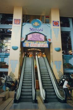 an empty escalator in front of a building