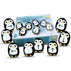 a bunch of penguins that are sitting in front of a cardboard box with the words pre - cooling penguin on it