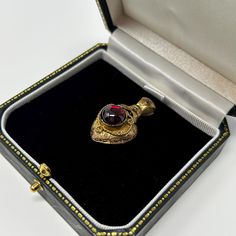 This beautiful pendant dates back to the Georgian era, circa 1820s. Crafted from 18ct gold, it features a stunning garnet heart as the main stone. The pendant is perfect for women who love vintage and antique jewelry. It would make a wonderful addition to any collection, and is sure to be a conversation starter. Condition notes: There is a small mark on the right side of the heart where part has chipped off from normal wear and tear through the years. Original piece from the 1820s. Victorian Yellow Gold Jewelry For Valentine's Day, Victorian Heart Pendant Jewelry For Formal Occasions, Victorian Necklace For Formal Valentine's Events, Heirloom Style Heart Pendant Jewelry For Formal Occasions, Heirloom Heart Pendant Jewelry For Formal Occasions, Victorian Heart Pendant Jewelry With Intricate Design, Victorian Heart Pendant With Intricate Design, Antique Heart-shaped Jewelry For Formal Occasions, Antique Heart Shaped Jewelry For Formal Occasions