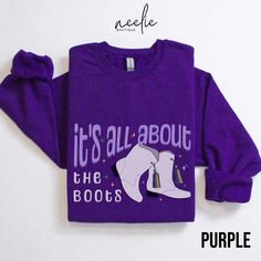 Those iconic majorette marching boots and their purple, green and gold tassels are 100% ready for the parties and parades of carnival season with this sweatshirt!  Mardi Gras weather is unpredictable...sometimes it's hot, sometimes it's cold....so you probably need this in the t-shirt version as well:  https://www.etsy.com/listing/1620105763 DETAILS This classic, unisex, heavy-blend crewneck sweatshirt is super comfortable! Made from 50% cotton, 50% polyester, this combination will fit like a well-loved favorite. The collar is ribbed knit, so it retains its shape even after washing, and there are no itchy side seams. As with any online product, the colors may look slightly different on a computer/phone screen than they do in person. We do not accept returns or exchanges unless the product Mardi Gras Sweatshirt, Party Sweaters, It's Hot, It's Cold, Purple Green, Mardi Gras, Green And Gold, New Orleans, Crewneck Sweatshirt