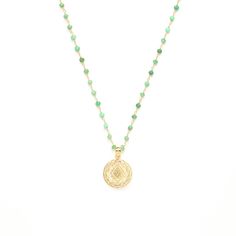 Bring the energy of abundance, good luck, and prosperity into your life with our Sri Yantra necklace with Green Chrysoprase. The Sri Yantra is one of the most renowned Sacred Geometry symbols, and in Hindu tradition is considered the "Mother" of all sacred symbols and the 'Supreme Manifestor'. It's believed that wearing or meditating on this symbol can bring about the realization of all our worldly and material desires, including wealth, and good fortune. The Ancient yogis used it to unravel the Bohemian Gold Aventurine Necklace, Spiritual Jade Medallion Necklace, Green Gemstone Necklace For Good Luck, Gold Aventurine Necklaces For Healing, Green Necklace For Meditation - May Birthstone, Spiritual Chrysoprase Gemstone Necklaces, Spiritual Chrysoprase Gemstone Necklace, Spiritual Jade Necklace For May Birthstone, Jade Necklace For May Birthstone With Spiritual Style