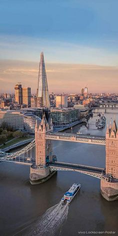 an aerial view of the london skyline and tower bridge