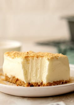 a piece of cheesecake sitting on top of a white plate