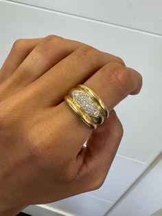 Chunky Gold Vintage ring, 0.2CT Round Natural Diamond, 18k Yellow Gold, Gold Vintage Jewelry,thick band, chunky ring, estate ring, tank ring Jewelry Material: Yellow + White Gold 18k (the gold has been tested by a professional) Total Carat Weight: 0.20ct (Approx.) Total Metal Weight: 9.40g Size: 8 US Grading Results: Stone Type: Diamond Shape: Round Carat: 0.20ct (Approx.), Stones quantity:16 Color: F Clarity: SI1 So who is Nola? Nola is our creation and imagination. All the idea of Nola is to b Chunky Ring, Chunky Gold Rings, Chunky Gold Engagement Ring, Chunky Engagement Rings, Thick Ring, Estate Rings, Gold Engagement, Gold Statement Ring, Chunky Rings