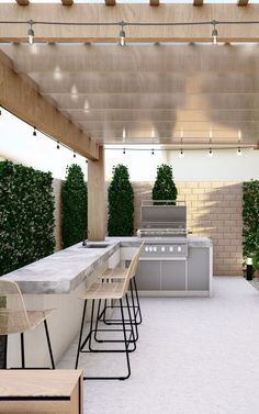 an outdoor kitchen and dining area is shown in this 3d renderer image, with seating for four