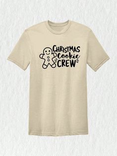 Introducing our Christmas Cookie Crew Shirt, the perfect addition to your festive wardrobe. Whether you're attending a Christmas party or lounging in Christmas pajamas, this shirt will bring the perfect Christmas vibes to any occasion. Get yours now and embrace the holiday spirit in style.Christmas Cookie Crew Shirt, Christmas Bakery Shirt, Christmas 2024 Shirt, Christmas Gingerbread Tee, Christmas Costume Sand Casual  Short Sleeve Fabric Animal,Cartoon,Christmas,Colorblock,Figure,Geometric,Grap Christmas Baking Shirts, Christmas Cricut Shirts, Christmas Shirt Ideas, Christmas Cookie Shirt, Gingerbread Shirt, Christmas Bakery, Cookie Shirt, Cartoon Christmas, Christmas Costume