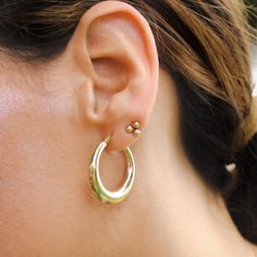 Our favorite everyday hoop. These add effortless chic to any outfit, and are hollow to avoid weighing down the ear. Precious Metal: 14K Solid Yellow Gold Lock: Secure Snap Bar Closure Hoops: 28.4 x 26mm Hypoallergenic Does not tarnish Water Resistant Available as a pair Each will come beautifully gift-packaged and ready to give ***Note: Prices and availability are subject to change without notice. Follow us on Instagram Oval Hoop Earrings For Everyday, Everyday Oval Hoop Earrings For Pierced Ears, Everyday Oval Hoop Earrings, Skin Lotion, Gold Diamond Jewelry, Take Care Of Me, Precious Metal, Effortless Chic, Custom Necklace