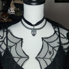 Embrace your Darker Side with this alluring Black Skull Layered Choker. Wear casual or dressy, whatever your heart desires. Add more Skulls to your look and pair with our Rings, Earrings, Bracelets, and Necklaces! Details: Fashion Jewelry ~ Handmade Diameter: 13 inches + 2 inch extender Skull charm: 35 x 22 mm Spooky Adjustable Black Jewelry, Adjustable Black Spooky Jewelry, Halloween Skull Jewelry With Skull Print, Metal Skull Print Jewelry For Halloween, Punk Skull Jewelry For Halloween, Punk Style Skull Jewelry For Halloween, Black Spooky Jewelry For Party, Black Witchy Jewelry For Alternative Fashion, Spooky Black Jewelry For Party