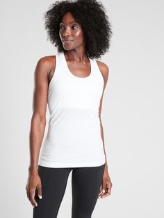 FOR: Medium to high impact workouts at the gym, studio or outdoors FEEL: Seamless construction for maximum comfort and minimal chafing FAVE: XT2® Anti-Odor Technology™: Eliminates odor without the chemicals, lasts as long as the garment Fitted, hip length Body length in size medium: 26" Workouts At The Gym, Compression Tank Top, Bday Wishlist, Gym Studio, Running Clothes Women, Workout Tops For Women, Relaxed Outfit, Confident Woman, Running Clothes