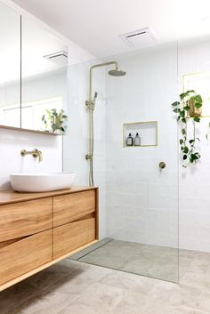 the bathroom is clean and ready to be used as a bathtub or shower stall