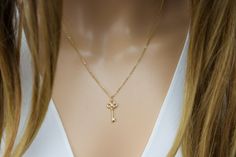 "Dainty key necklace gold-silver-key jewelry-small key charm-delicate-Holiday gift idea-gift for mom friend grandma daughter-Christmas gift Length: 16\"+2\" inch  as shown on the pictures. Charm size:8mm x 20mm Material:18K gold dipped with cubic zirconia, white gold dipped Lobster clasp Available...gold, silver comes with a cute little gift box. View more jewelry HERE: https://www.etsy.com/shop/DearMia?ref=shopsection_shophome_leftnav View other Key jewelry  here: https://www.etsy.com/shop/Dear Elegant Sterling Silver Key Necklace, Elegant Nickel-free Charm Necklaces For Birthday Gift, Elegant Two Keys Necklace As Gift, Elegant Two Keys Necklace Gift, Elegant Two Keys Necklace For Gift, Christmas Gift Daughter, Mom Friend, Daughter Christmas, Key Jewelry