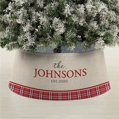 a christmas tree in a burlock with the words, the johnsons