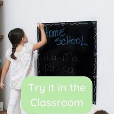 two children writing on a blackboard with the words try it in the classroom below