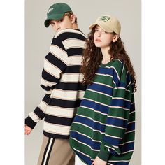 Men's Color-Blocking Striped Cotton Long-Sleeved T-Shirt - graphictee.co Casual Sweater With Contrast Color, Casual Green T-shirt For Winter, Long Sleeve Cotton Sweater With Color Matching, Casual Black Sweater With Striped Sleeves, Casual Color Block Tops For College, Winter Casual Sweatshirt With Contrast Color, Casual Striped Sweatshirt For Streetwear, Casual Cotton Color Block Sweater, Casual Fall Sweatshirt With Color Matching