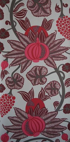 a red and white wallpaper with flowers on it