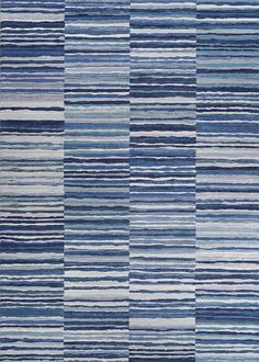 blue and white striped rug with vertical stripes on the bottom, in various sizes and colors