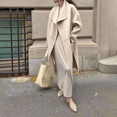 Elegant Long Oversized Wool Coat, Oversized Long Cashmere Outerwear, Oversized Long Classic Wool Coat, Classic Oversized Long Wool Coat, Classic Long Oversized Wool Coat, Oversized Long Wool Coat For Work, Oversized Long Outerwear In Neutral Color, Buy Coats, Boutique Fashion