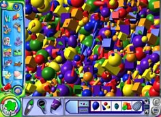 a computer screen with lots of colorful balls and shapes on it's display area