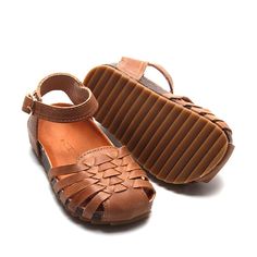 ***Looking for a smaller size? Click HERE to see this same style with smaller sizes in a soft sole.*** Elevate your summer footwear with our Camel Woven Sandals, available in US sizes 5-10. These versatile sandals are the perfect accessory, effortlessly transitioning from casual to dressy occasions. Designed with genuine leather and a sturdy hard sole, they provide the ideal combination of style, comfort, and durability. Key Features: Stylish Design: The intricate woven pattern and camel color m Slip-on Open Toe Sandals With Stitched Sole, Closed Toe Brown T-strap Sandals For Spring, Brown Closed Toe T-strap Sandals For Spring, Brown Closed Toe T-strap Sandals, Brown Round Toe Sandals For Summer, Adjustable Cushioned Slingback Slip-on Sandals, Casual Brown Ankle Strap Flats, Cushioned Round Toe Synthetic Sandals, Synthetic Sandals With Cushioned Footbed And Round Toe