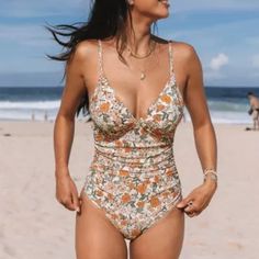 Cupshe Elodie Ditsy Floral Tummy Control One Piece New With Tag Brand Tag Size M / Us 8-10 Cup 34c/D, 36 B/C / Bust 36.0-38.0 / Waist 29.0-31.0"/ Hips 39.0-41.0" Details: Front Ruching / Adjustable Shoulder Straps / Paisley Pattern / Soft Removable Cups Fabric: Materials: 80% Nylon, 20% Elastane / Lining: 92% Polyester, 10% Spandex Color Multi-Color All Over Floral Print Orange V-neck Swimwear For Spring, Peach Stretch Swimwear For Spring, Spring Orange V-neck Swimwear, Casual Fitted Orange Swimwear, Orange Floral Print Swimwear For Summer, Fitted Orange Floral Print Swimwear, Summer Orange Floral Print Swimwear, Orange Sleeveless Swimwear For Spring, Fitted Casual Floral Print Swimwear