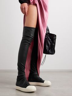 Rick Owens is always championing the avant-garde. These over-the-knee boots have been made in Italy from stretchy leather and have contrasting rubber toe caps and soles that resemble the label's signature sneakers. Rick Owen Outfit, Thigh Boots Outfit, Rick Owens Boots, Rick Owens Shoes, Denim Flats, Rick Owens Women, Thigh Boot, Sport Swimwear, Aesthetic Shoes