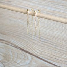 Gold double sided chain invisible resin clip on earrings, metal is gold plated over brass. Details :- **There are 2 sides, front side length is 41mm, back side length is 53mm **Approx weight is 0.57g (1.14g per pair) ♥ ♥ Invisible resin clip on are soft and elastic, so it is comfortable to wear and will not drop off easily. Since they are invisible so they look like pierced ear earrings. But they are fragile, so pls handle these earrings with care and don't spread too wide. ♥ ♥ These earrings co Minimalist Double Chain Dangle Jewelry, Elegant Gold Earrings With Double Chain, Dainty Gold Dangle Clip-on Earrings, Non Pierced Earrings, Pierced Ear, Ear Earrings, Earrings Metal, Drop Off, Star Studs