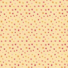 a yellow background with small red and pink stars on it's sides, all over the surface